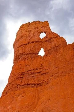 Dramatic Windows in a Rock Wall Stockfoto's