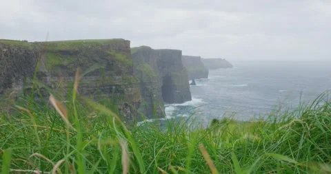 Dramatic Windy Cliffs and Rough Sea in 4K 스톡 동영상 303454020