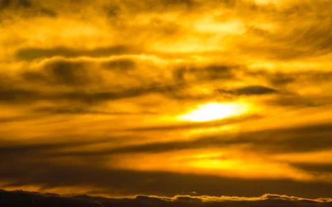 Dramatic wink of the sun Stock Photos