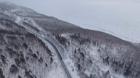 Dramatic winter Aerial drone follow Trans-Siberian railway passengers train Video stock 88464654