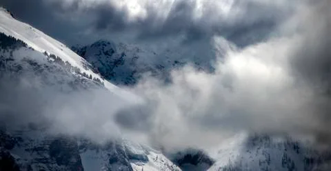 Dramatic Winter Clouds on a Rocky Mountain Day Stock Photos
