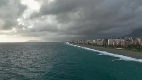 Dramatic Winter Coastline: Aerial Perspective of Textured Stormy Sea Stock Footage 242614897