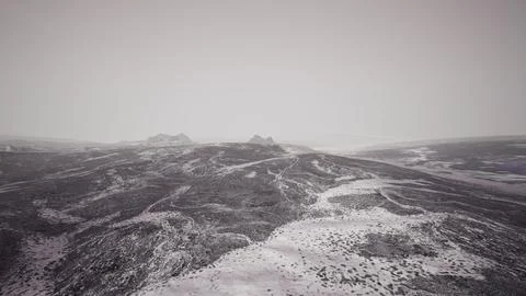 Dramatic winter dark desert steppe on a highland mountain plateau Stock-Illustration