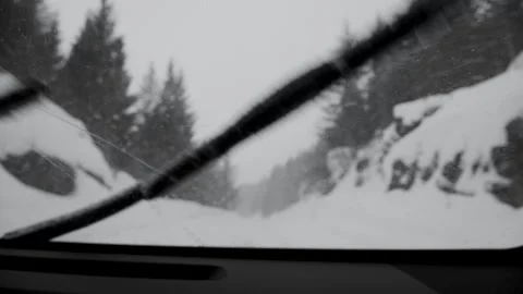 A dramatic winter driving scene in Lofoten, Norway, during snowstrom. Stock Footage 332628981