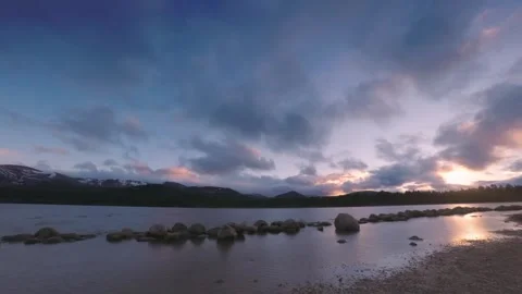 Dramatic winter evening clouds Scottish Loch view timelapse speed effect 스톡 동영상 313637324