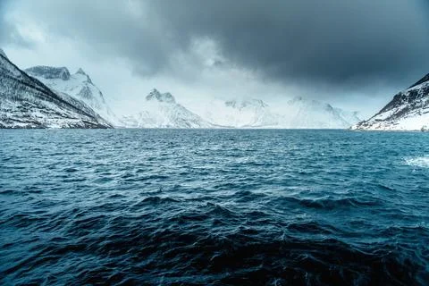 Dramatic Winter Landscape with Snow-Covered Mountains Stock Photos