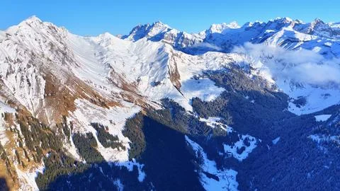 Dramatic Winter Light Over French Alpine Mountains Stock-Fotos