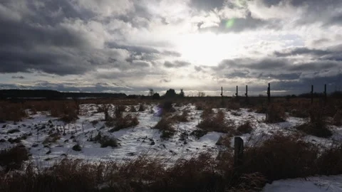 Dramatic Winter Sky Over Snowy Field with Clouds Stock Footage 271201051