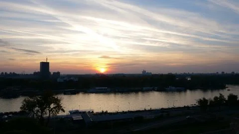Dramatic Yellow and Orange Sunset Sky Cloudscape over Belgrade Stock Photos