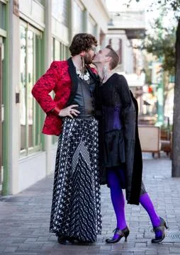 Dramatic Young Gender Fluid Men Kissing Stock Photos