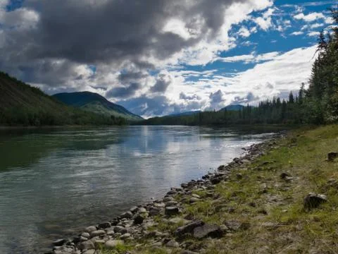 Dramatic yukon river cloudscape Stock Photos