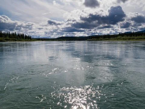 Dramatic yukon river cloudscape Stock Photos