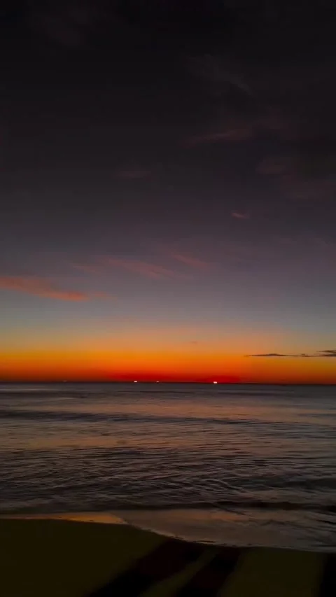 Dramatically Bright Sunset Over Ocean and Beach Horizon Video stock 342267239