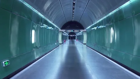 Dramatically Lit Subway Station Tunnel,4K Video stock 296594048