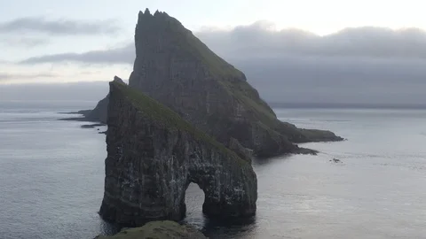 Drangarnir Sea Stack and Tindhólmur Island in the Faroe Islands. Stock Footage 121876705