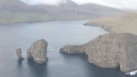 Drangarnir Sea Stack and Tindhólmur Island in the Faroe Islands. Stock Footage 121876809