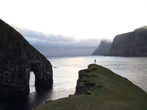 Drangarnir Sea Stack in the Faroe islands in Denmark. Stock Footage 130116690