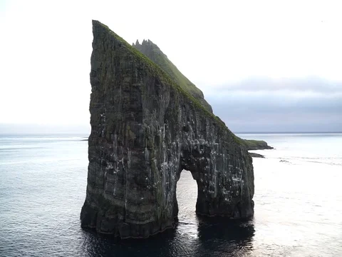 Drangarnir Sea Stack in the Faroe islands in Denmark. Stock Footage 130116709