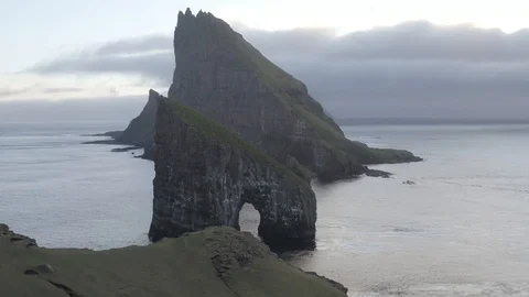 Drangarnir Sea Stack in the Faroe islands in Denmark. Stock Footage 130117160
