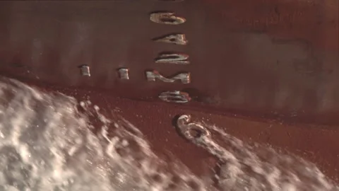 Draught mark white figures of the cargo ship - ship's forward. Stock Footage 91070924