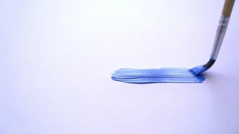 Draw with blue paint on a white background 库存影片 176934676