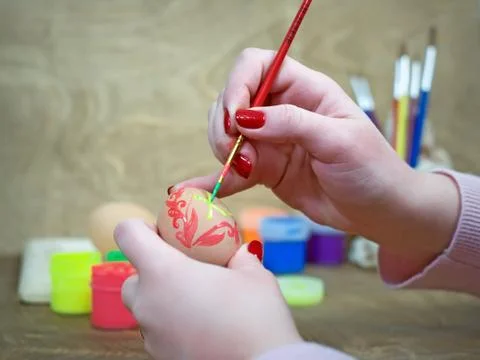 Draw on the egg for Easter Stock Photos