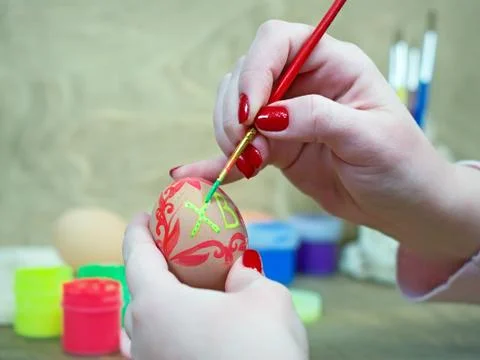 Draw on the egg for Easter Stock Photos