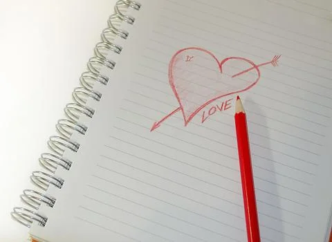 Draw hart with red crayons Stock Photos