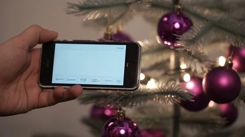 Draw a heart on the smartphone Stock Footage 70123295