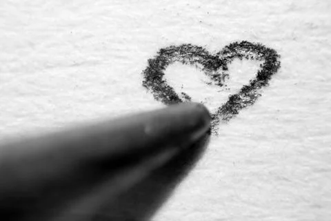 Draw a heart under a microscope 스톡 사진