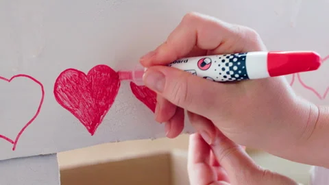 Draw hearts, declaration of love, romantic surprise gift, Valentine Day date Stock Footage 283941848