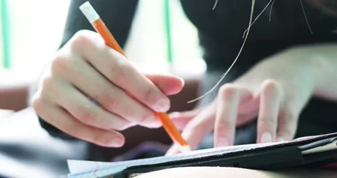 Draw lines in a notebook with a pencil and a ruler. Higher Mathematics, Geom Stock Footage 335782238