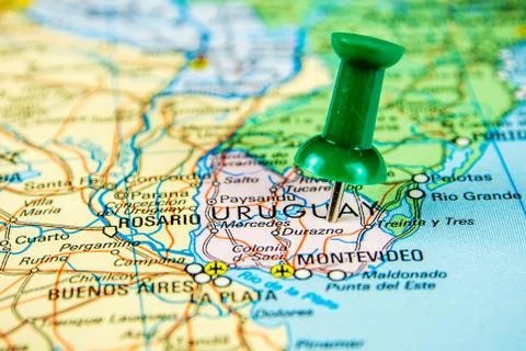 Draw-pin stick into real map, travelling to Uruguay Stock Photos