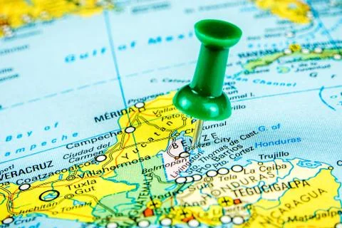 Draw-pin stick into real map, travelling to Belize Stock Photos
