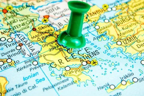 Draw-pin stick into real map, travelling to Greece Stock Photos