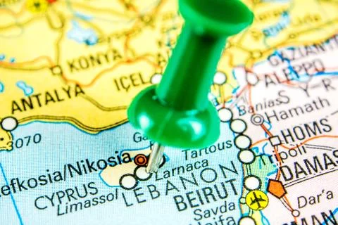 Draw-pin stick into real map, travelling to Cyprus Stock Photos