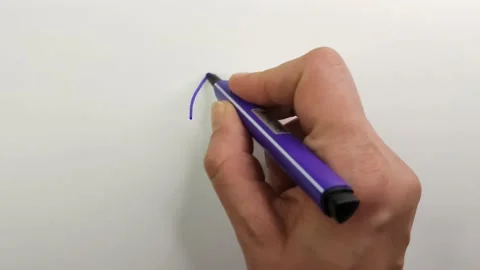 Draw a question mark with a purple felt-tip pen on a white piece of paper Stock Footage 170829888