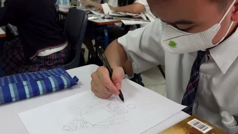Draw a robot on a paper Stock Footage 210139502