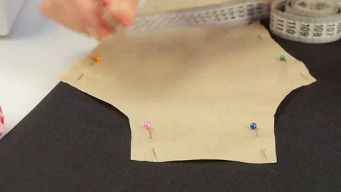 Draw on the sewing fabric. Close up Stock Footage 69251735