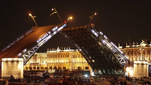 Drawbridge. Night view from the shore to the bridge, boats, water transport. Stock Footage 235187256