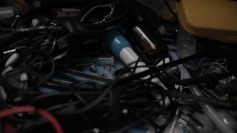 Drawer with cables and mixed stuff from hoarder man Stock Footage 223940781