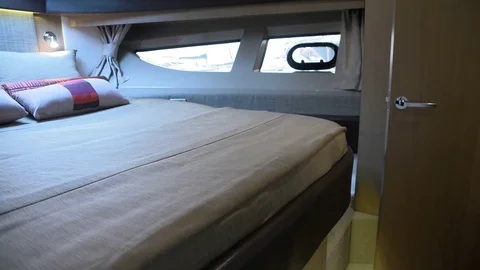 Drawers under bed in main cabin on a boat Stock Footage 72525036