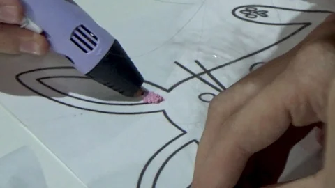 Drawing with 3D pen on paper Stock Footage 117252439
