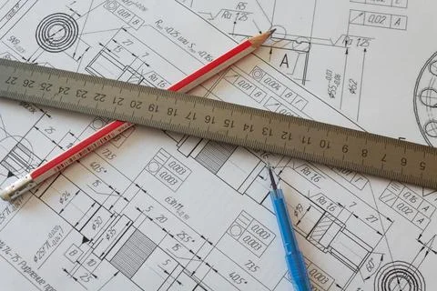 Drawing accessories on the project under development from the drawings. The c Stock Photos
