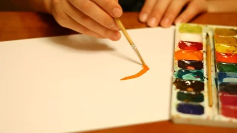 Drawing and coloring the orange circle with watercolor Stock Footage 123135029