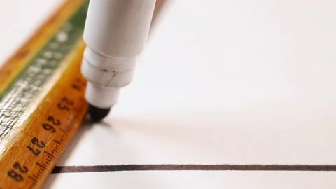 Drawing black line using ruler | Stock Video | Pond5