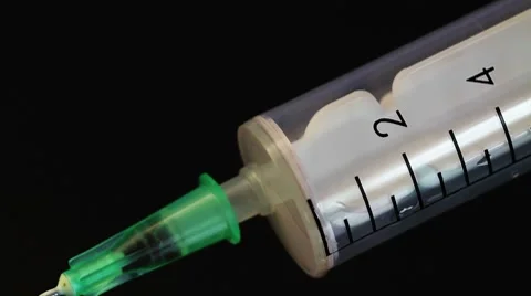 Drawing blood in the syringe Stock Footage 7906314
