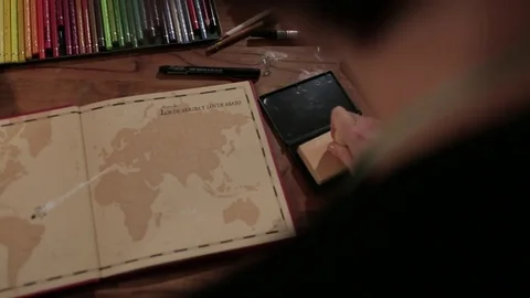 Drawing in book Stock Footage 77046291