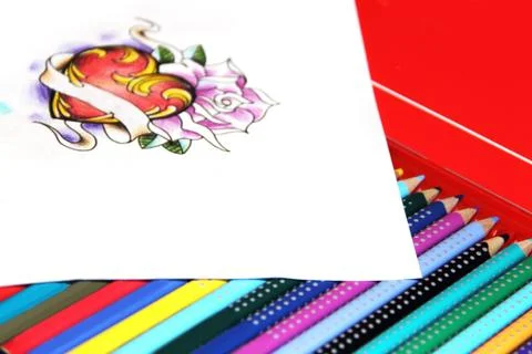 Drawing on box with pencils Stock-Fotos