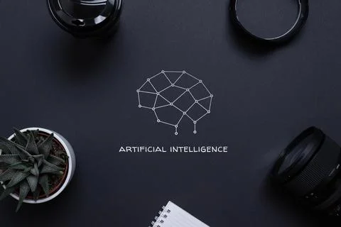 Drawing of a brain from network nodes and artificial intelligence text on a d Stock Photos